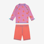 UV Protective Surf Set Pink Starfish, a two-piece swimwear set with a pink starfish-patterned top and coral shorts, perfect for sun protection.
